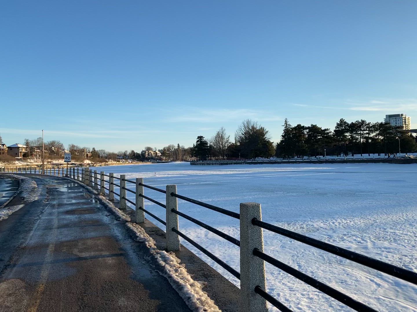 Riding my bike next to the frozen Rideau Canal